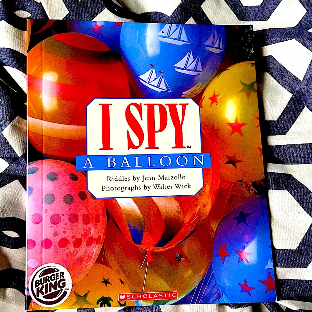 I SPY Scholastic Reading Book.